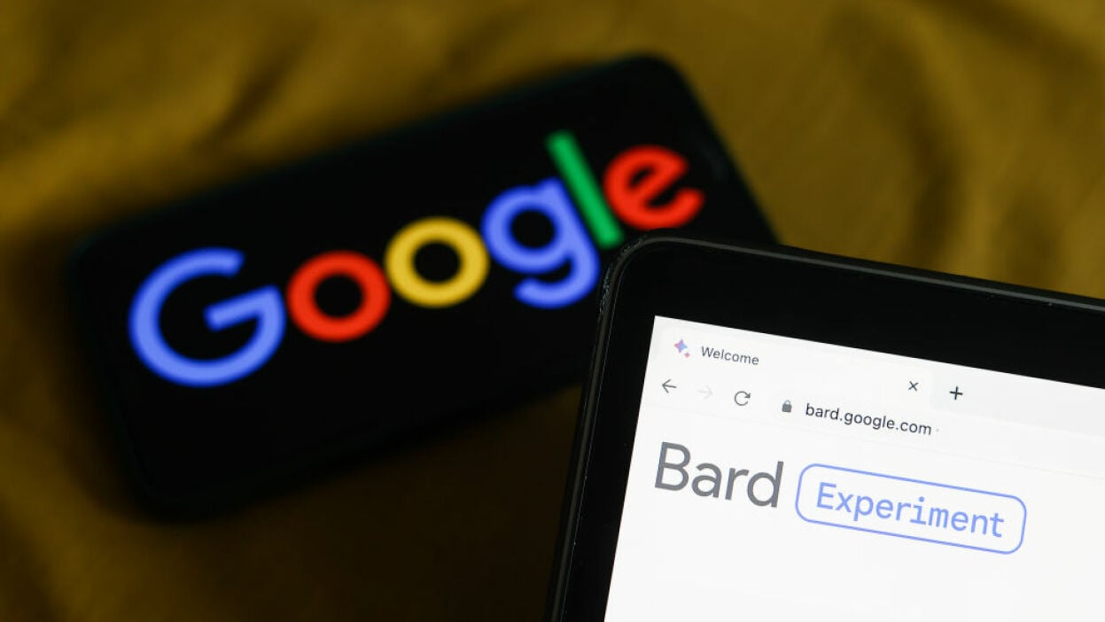 Bard AI chatbot on a smartphone in front the Google logo