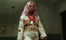 Stephanie Hsu, playing Jobu Tupaki in 'Everything Everywhere All At Once,' wears an Elvis costume.