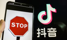 A stop sign on a phone screen and the TikTok logo with some Chinese characters