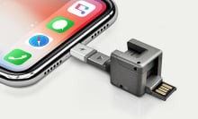 WonderCube being plugged into an iPhone
