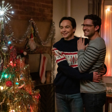 Jim Parsons and Ben Aldridge stand near a Christmas tree in a film still from the movie "Spoiler Alert."