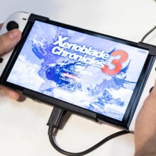 Nintendo Switch console playing Xenoblade Chronicles 3