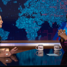 Alexis McGill Johnson sits across the desk from Leslie Jones on "The Daily Show."
