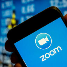  The Zoom logo displayed on a smartphone screen.
