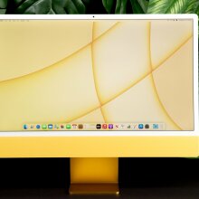 Yellow iMac on jungle background