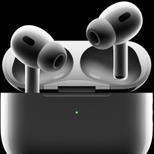 dramatically shaded airpods pro buds and their case on a black background