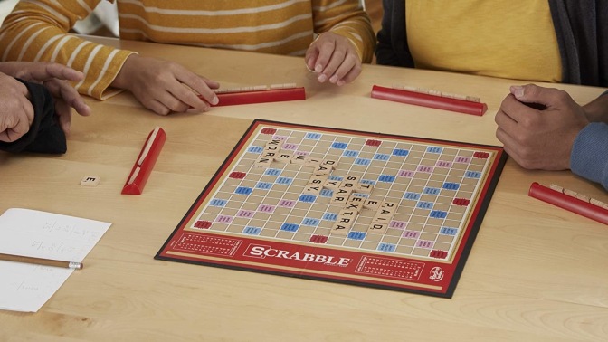 People playing Scrabble.