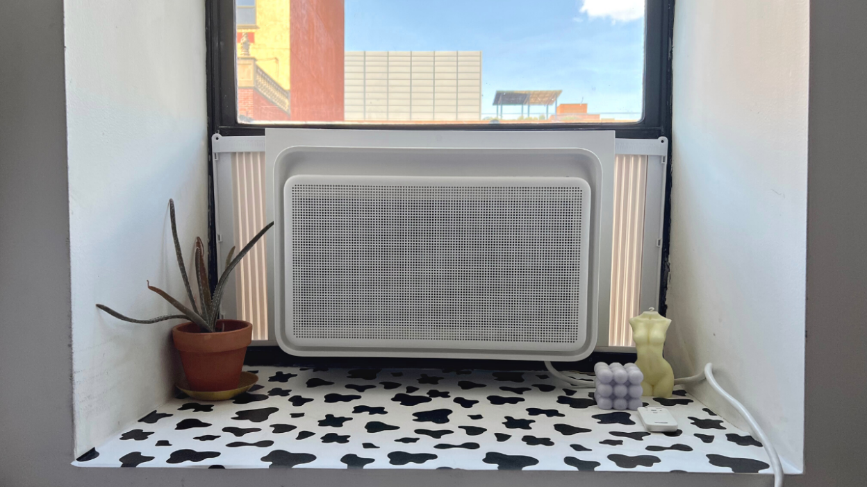 modern-looking air conditioner unit in window