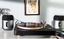 record player with kapsule 360 speakers and artwork in background