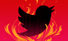 Twitter logo on fire