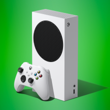 an xbox series s with its xbox wireless controller against a green geometric background
