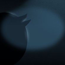 A darkly lit illustration of the Twitter logo bird in a black room. A very dim spotlight shines on its head. 