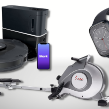 shark robot vacuum, sunny health and fitness rowing machine, and apple watch with gray background