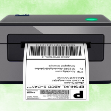 Thermal label maker on green background