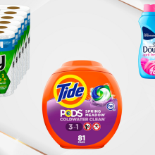 Paper towels, Tide pods, and fabric softener on light beige background