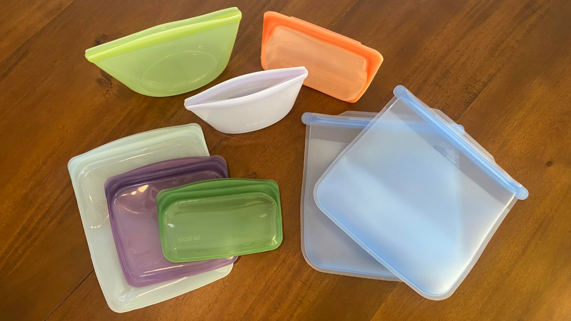 a top-down view of reusable silicone storage bags from stasher and ziploc endurables