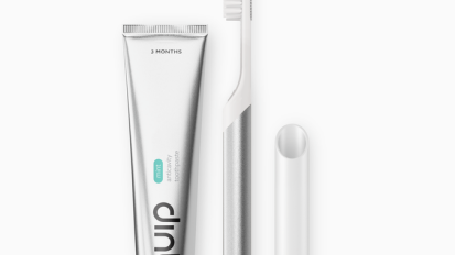 Quip electric toothbrush on a white background.